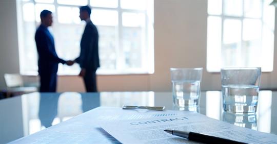 Men negotiating successfully