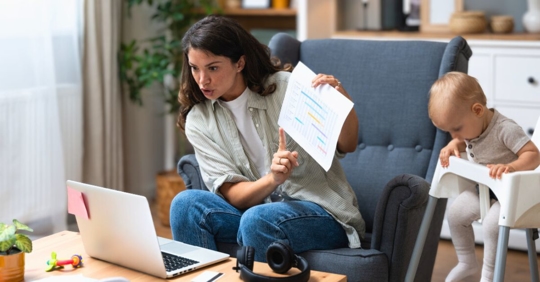oung single divorced mother with baby using laptop computer for video call with her lawyer, talking about ex husband who not paying alimony